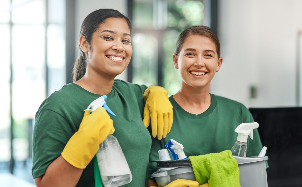 Two Grand Max cleaners smiling